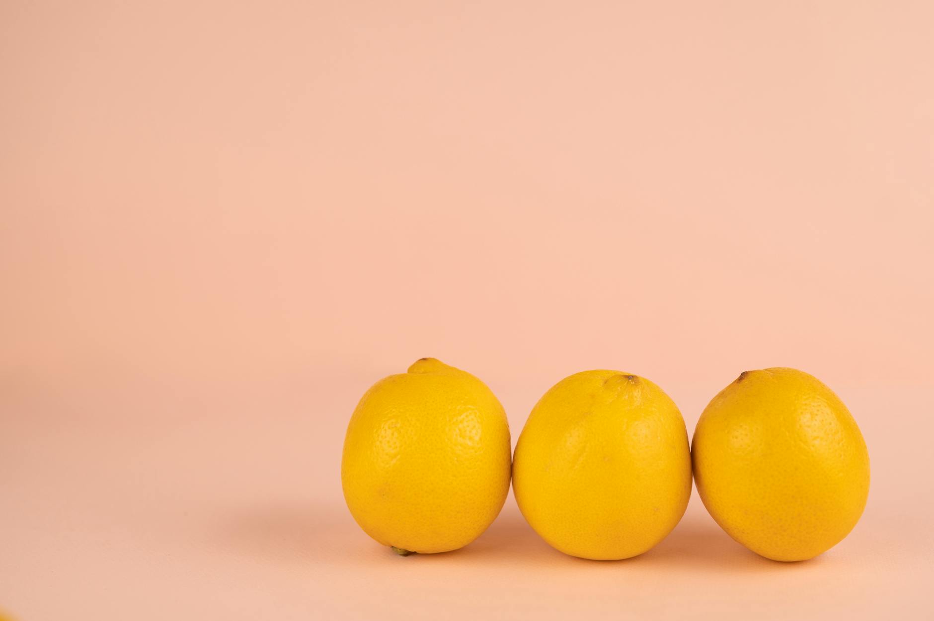 Vibrant collection of clitoral vibrators and adult toys arranged on bright yellow surface